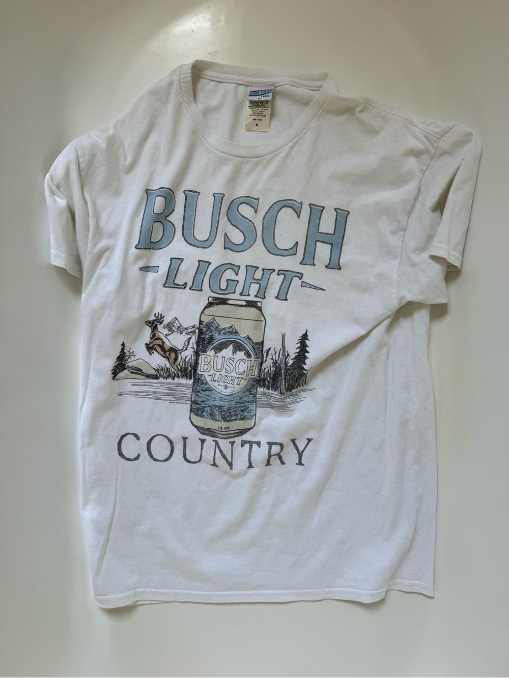 Junk Food Clothing White Tee with Pale Blue Graphic